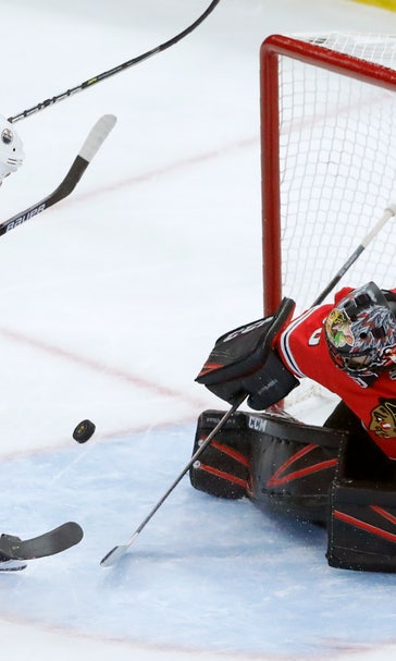 Crawford lead Blackhawks to 1st win, 3-1 over Oilers